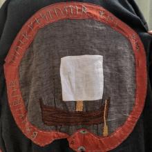 High Viking Age Merchant ship on the back of the coat