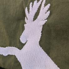Close up of the appliqued stag rampant