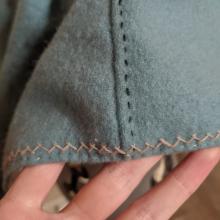 Close up of the seam treatments on the hem of the hood